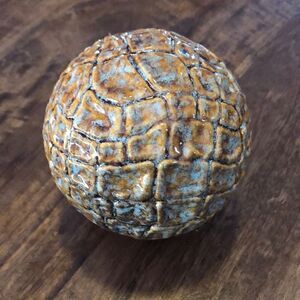 Deco 79 Ceramic Handmade Carved Orb 4”